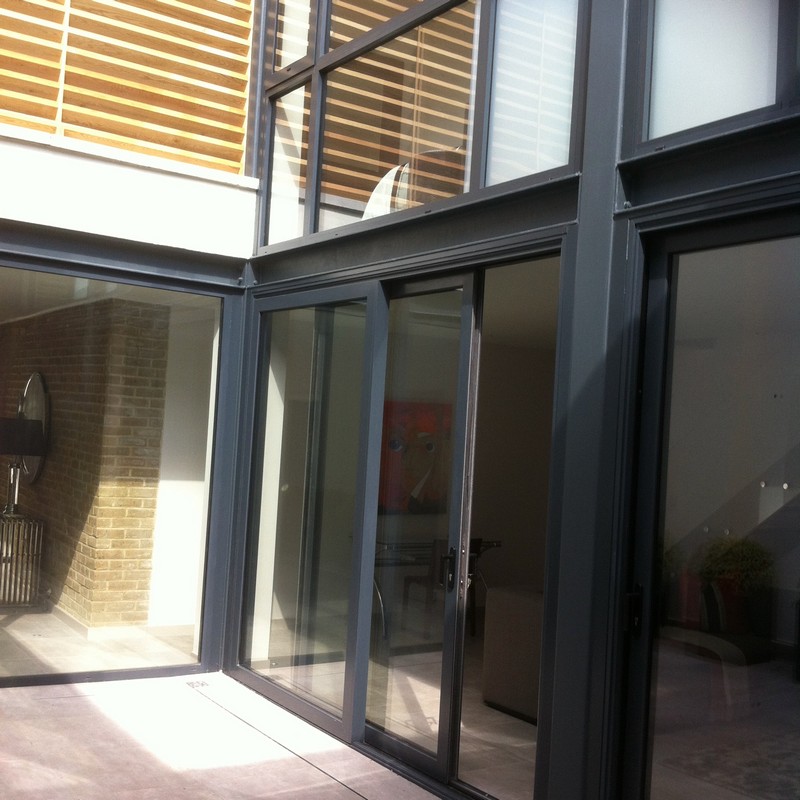 Anthracite aluminium sliding patio doors fitted in Muswell Hill