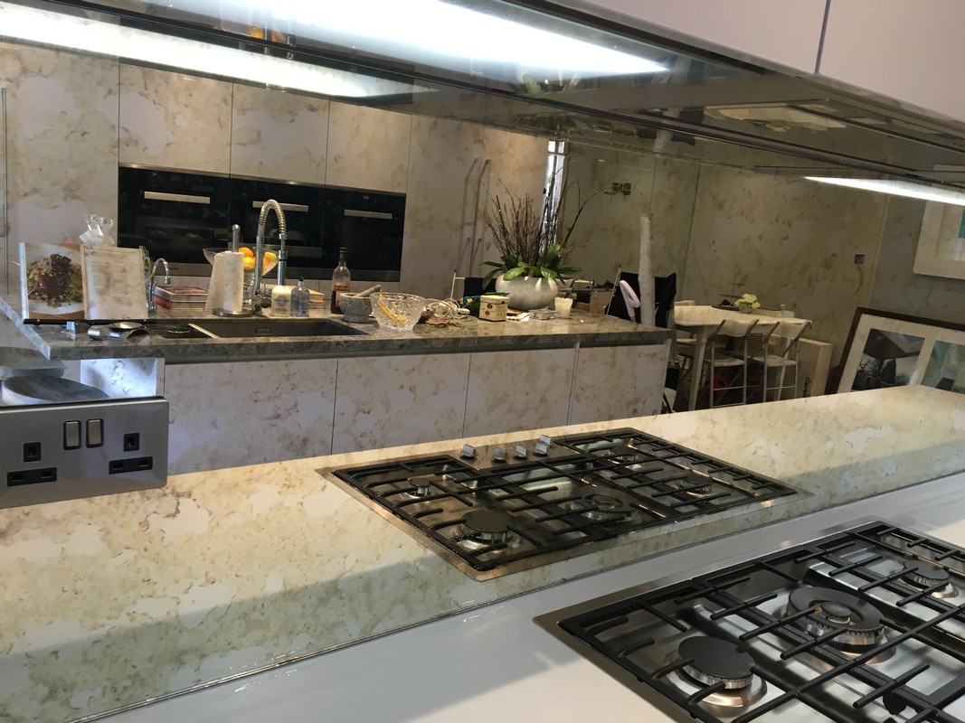 Mirror glass splashback in Muswell Hill luxury kitchen